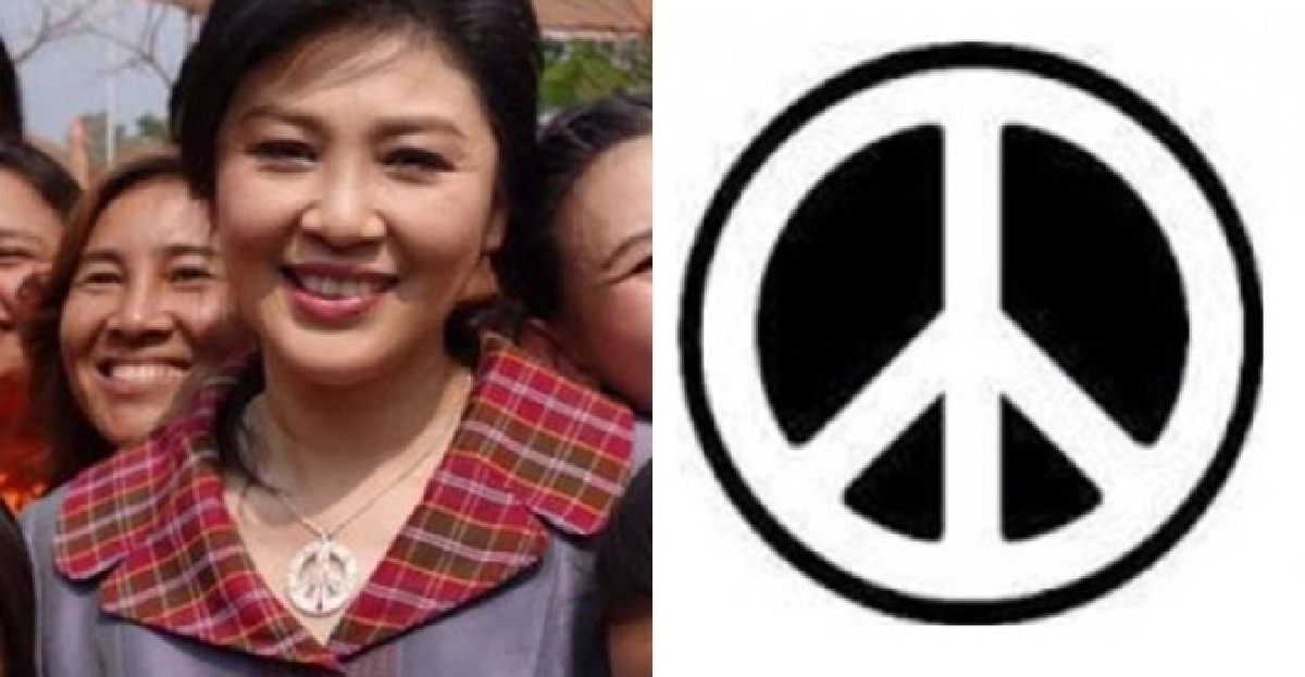 'ปู'โชว์!แขวนจี้สัญลักษณ์สันติภาพ 'ปู'โชว์!แขวนจี้สัญลักษณ์สันติภาพ