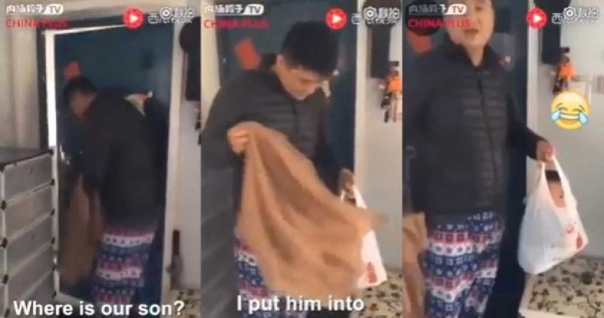 น่าเอ็นดู !! พ่อชาวจีนปกป้องลูกน้อยจากลมแรง น่าเอ็นดู !! พ่อชาวจีนปกป้องลูกน้อยจากลมแรง